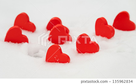 red hearts on the snow= 135962834