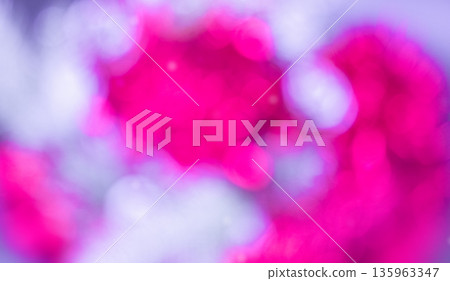 Abstract defocused lights. Soft focus image of vibrant magenta and white blurred shapes against a pale purple background, creating a dynamic bokeh effect. The mood is dreamy and colorful. Abstract defocused lights. Soft focus image of vibrant magenta and white blurred shapes against a pale purple background, creating a dynamic bokeh effect. The mood is dreamy and colorful. 135963347