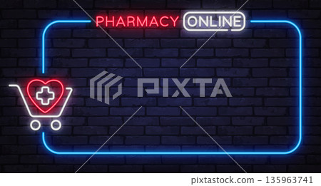 Neon pharmacy online sign with medical cart icon on dark brick background. Healthcare concept ideal for online drugstores, delivery services, or promo designs. 135963741