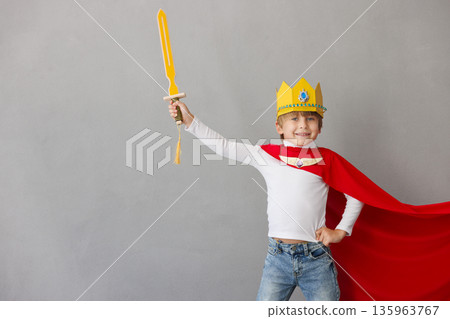 Child pretend to be knight. Kid having fun at home Child pretend to be knight. Kid having fun at home 135963767