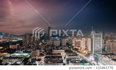 Shenzhen downtown night cityscape with busy urban blocks Shenzhen downtown night cityscape with busy urban blocks 135963776
