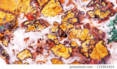 Rare chalcopyrite rock fragment displaying iridescent peacock colors, iron-copper mineral 135963924