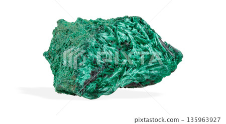 Vibrant green malachite crystal specimen with rich banding patterns isolated on white background Vibrant green malachite crystal specimen with rich banding patterns isolated on white background 135963927