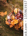 Autumn Basket with Dried Flowers and Leaves 135963937
