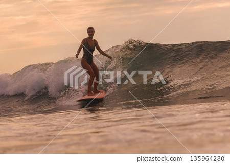 Wave Rider Supports Environmental Awareness During Evening Sunset 135964280