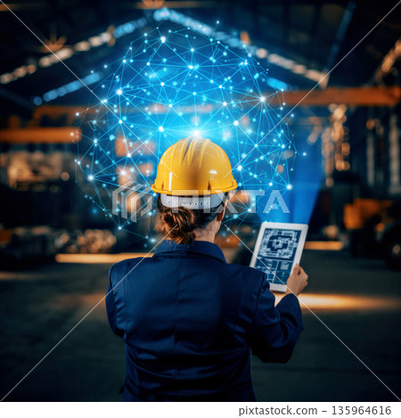 Engineer using technology in a factory to monitor data and connect devices in industrial setting with bright lights Engineer using technology in a factory to monitor data and connect devices in industrial setting with bright lights 135964616