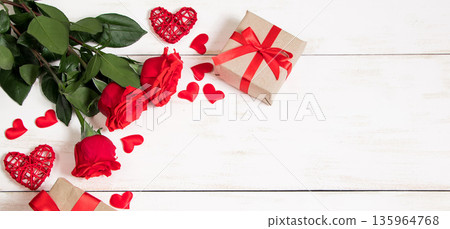 Bouquet of red roses and hearts on a white background. Valentine's day, banner format. Place for text. 135964768