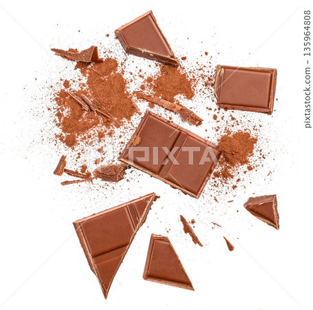 Broken milk chocolate pieces with cocoa powder isolated on white background 135964808