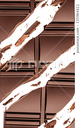 Broken dark chocolate bar with dramatic cracks on white background Broken dark chocolate bar with dramatic cracks on white background 135964811