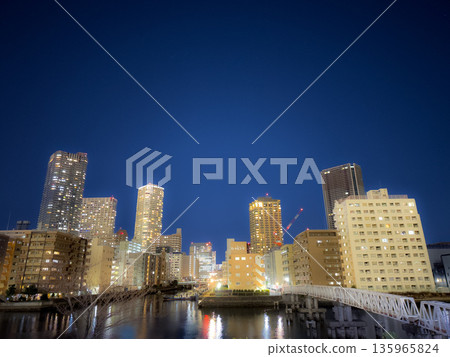 Sumida River and high-rise apartment buildings at night as seen from Toyosu 135965824