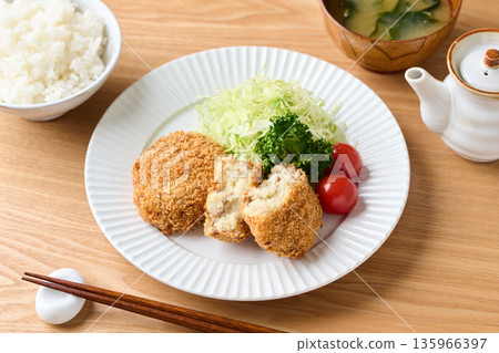 Potato croquettes on a plate 135966397
