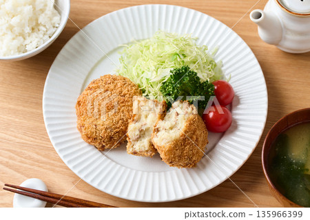 Potato croquettes on a plate 135966399