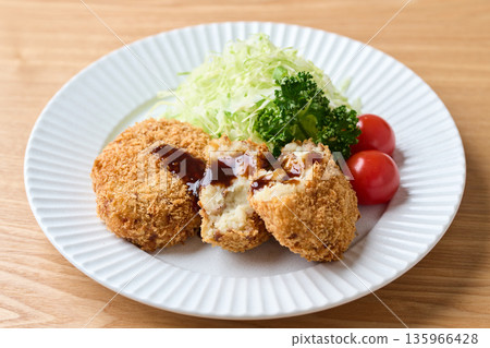 Potato croquettes with sauce Potato croquettes with sauce 135966428