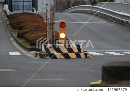 Yellow light in the median strip (blinker light) Yellow light in the median strip (blinker light) 135967879
