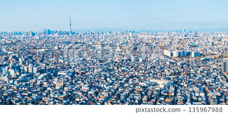 Aerial view of Tokyo, taken from above the Edogawa River near Yagiri in Matsudo City, towards the city center. Panorama Aerial view of Tokyo, taken from above the Edogawa River near Yagiri in Matsudo City, towards the city center. Panorama 135967988