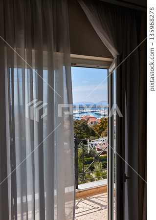 Apartment with sea view, open balcony door 135968278
