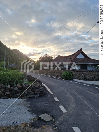 Rural landscape with morning sun rising 135969891