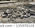 Pile of debris at road construction site 135970128