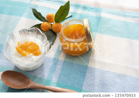 Yogurt topped with kumquats and homemade kumquat jam Yogurt topped with kumquats and homemade kumquat jam 135970933