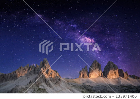 night landscape with stars and moon, milky way and galaxy in the mountains. beautiful nature background. 135971400