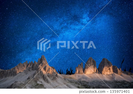 night landscape with stars and moon, milky way and galaxy in the mountains. beautiful nature background. 135971401
