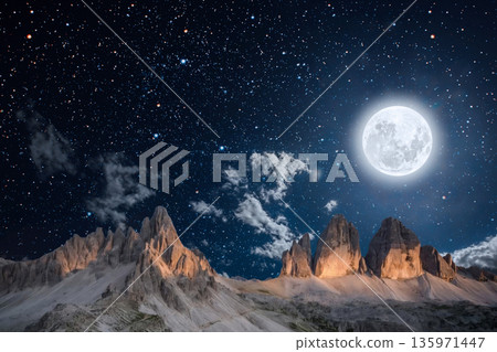 night landscape with stars and moon, milky way and galaxy in the mountains. beautiful nature background. night landscape with stars and moon, milky way and galaxy in the mountains. beautiful nature background. 135971447