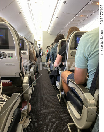Internal view of the cabin of a passenger plane Internal view of the cabin of a passenger plane 135972195
