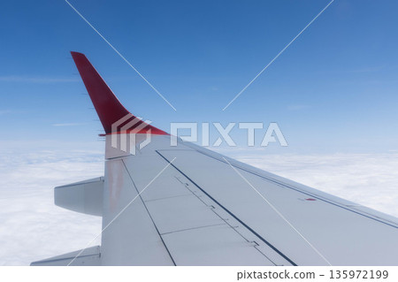 View from the plane wing and clouds, Italy 135972199