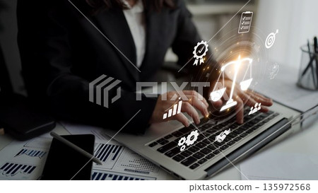 Digital law interface displaying justice scale, highlighting digital law Muxer 135972568