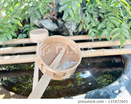 A water shop and a ladle A water shop and a ladle 135972605
