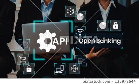 Business professionals discussing API technology and open banking in a modern office environment with digital interfaces and security elements Gluon 135972644