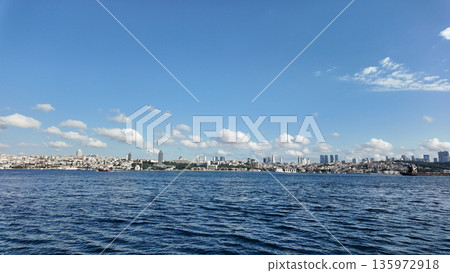 Istanbul City skyline view from the sea on a sunny day Istanbul City skyline view from the sea on a sunny day 135972918