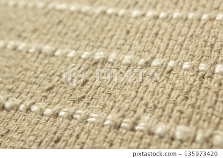 Close up of beige fabric 135973420