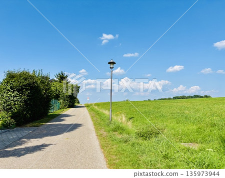 fresh blue sky road 135973944