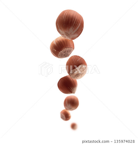 Ripe hazelnuts levitate on a white background 135974028
