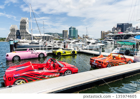 View of Argo Yacht Marina at Glory Pier of Kaohsiung Port, Taiwan, and the Kaohsiung Music Center building. View of Argo Yacht Marina at Glory Pier of Kaohsiung Port, Taiwan, and the Kaohsiung Music Center building. 135974605