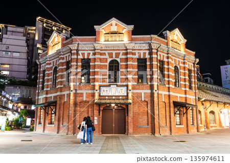 Night view of Ximending Red House Theater in Taipei, Taiwan. Though built as a marketplace in 1908 during Japanese rule, it has been used as a theater since 1945. Night view of Ximending Red House Theater in Taipei, Taiwan. Though built as a marketplace in 1908 during Japanese rule, it has been used as a theater since 1945. 135974611
