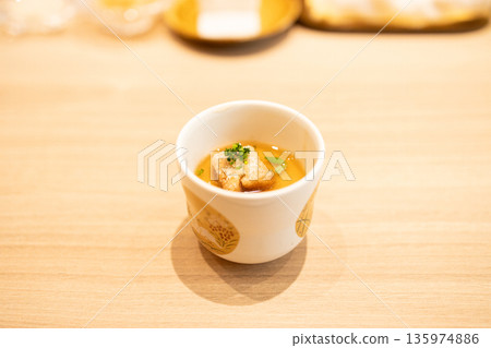 A Delicious steamed egg custard in Japanese style. A Delicious steamed egg custard in Japanese style. 135974886