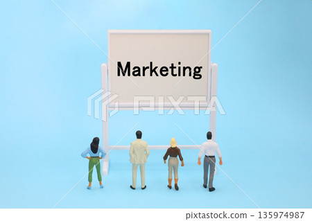 Marketing word written on a sheet of paper Marketing word written on a sheet of paper 135974987