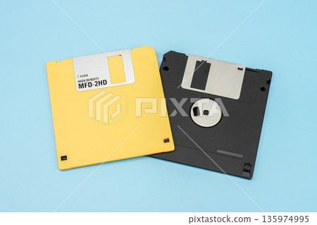 Yellow and black floppy disks Yellow and black floppy disks 135974995