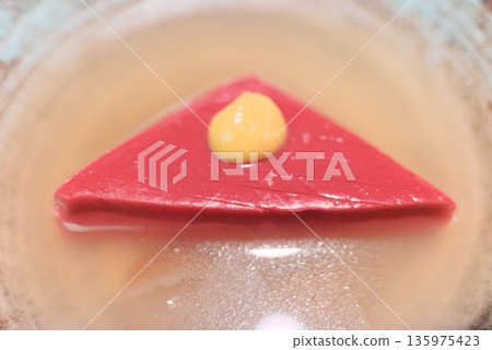 Triangular konjac in oden pot, broth-soaked stew ingredient 135975423