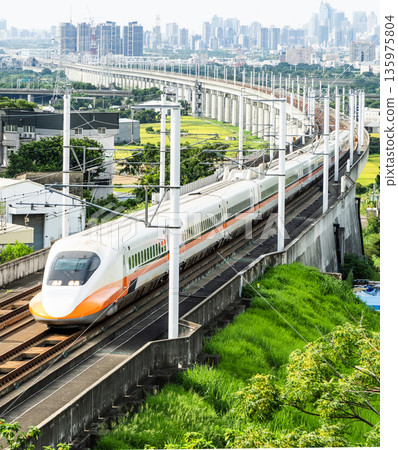 Overlooking view of the Taiwan High Speed Rail trains passing Changhua in Taiwan. It is the only high-speed railway in Taiwan. 135975804