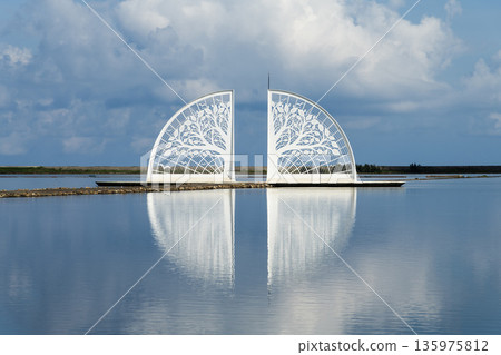 Beautiful Tree of Life installation art at Qinkunshen Fan-shaped Salt Fields in Jiangjun, Tainan, Taiwan, one of the Southwest Coast National Scenic Area attractions. Beautiful Tree of Life installation art at Qinkunshen Fan-shaped Salt Fields in Jiangjun, Tainan, Taiwan, one of the Southwest Coast National Scenic Area attractions. 135975812