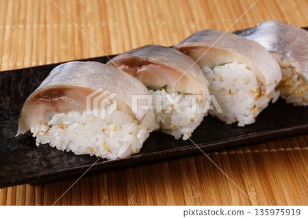 Marinated mackerel sushi roll Marinated mackerel sushi roll 135975919
