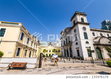 Cathedral Square with the Cathedral of the Our Lady of Nativity and the Bishop's House in Macau are UNESCO World Heritage. Cathedral Square with the Cathedral of the Our Lady of Nativity and the Bishop's House in Macau are UNESCO World Heritage. 135976178