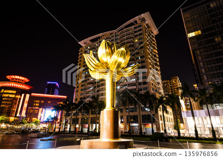 Night view of the large sculpture (Lotus Flower In Full Bloom) at Lotus Square in Macau, China. Night view of the large sculpture (Lotus Flower In Full Bloom) at Lotus Square in Macau, China. 135976856