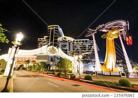 Beautiful night view of Wynn Palace, a hotel casino resort on the Cotai Strip in Macau, China. Beautiful night view of Wynn Palace, a hotel casino resort on the Cotai Strip in Macau, China. 135976861