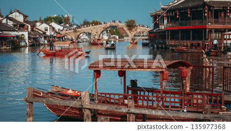 Captivating Scene of a Traditional Town with Water, Boats, and Historic Bridge. Zhujiajiao, Shanghai, China 135977368