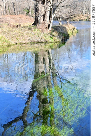 The scenery reflected on the surface of the Tade River The scenery reflected on the surface of the Tade River 135977687