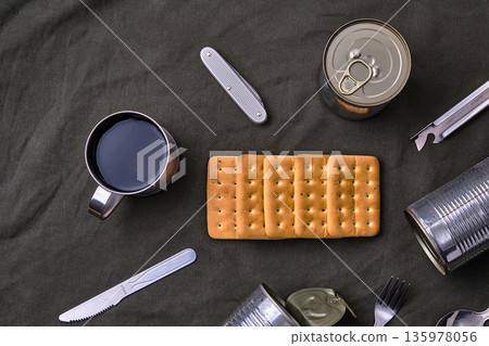 Hardtack and emergency food on a cloth Hardtack and emergency food on a cloth 135978056